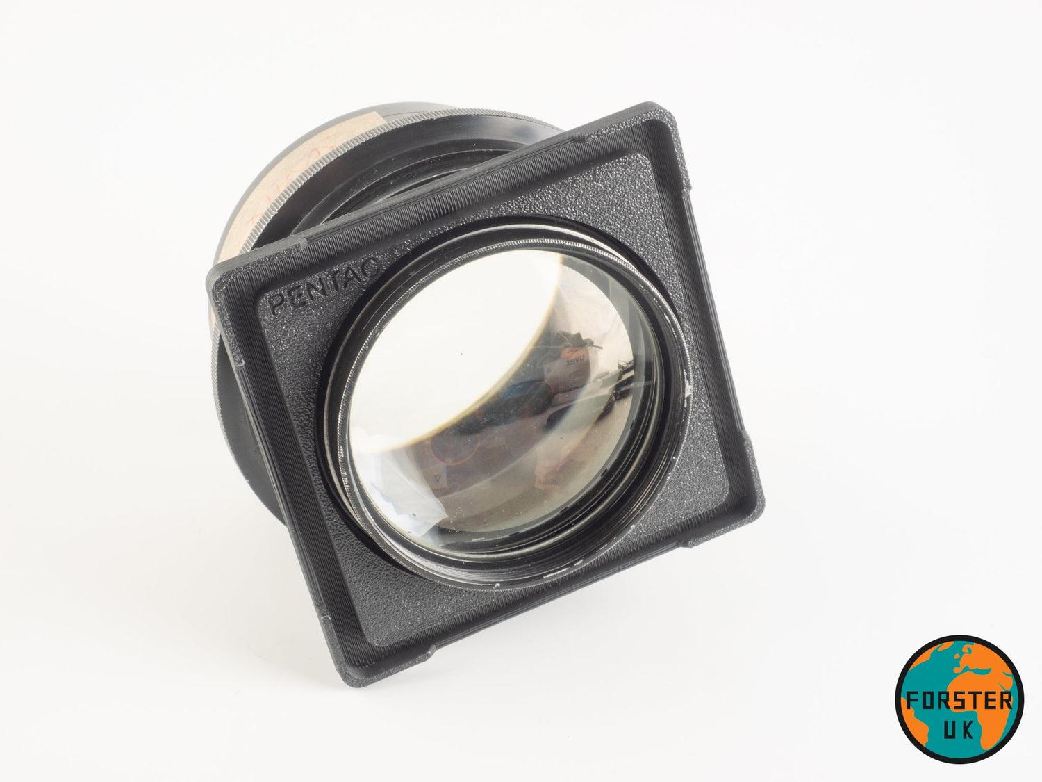 A vintage Dallmeyer Pentac lens, mounted on a Forster UK lens board.