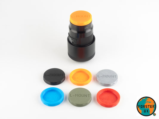Set of colorful camera lens caps with 'Foster UK' branding on a white background