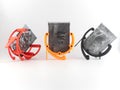 Three Platypus tilting drying racks in different colors (red, orange, and black) with sheet film loaded in them, displayed against a white background.